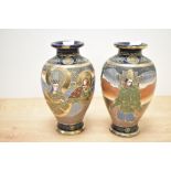 A pair of 20th-century Japanese Satsuma ware vases, featuring foliate and floral decoration with