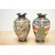 A pair of 20th-century Japanese Satsuma ware vases, featuring foliate and floral decoration with - Image 1 of 3