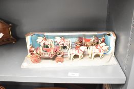 Two 20th-century Corgi Toys No. 41 1902 State Landau die-cast models, released to commemorate