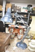 A vintage Luxo by Norway anglepoise table lamp in light blue colourway, measuring 62cm tall when