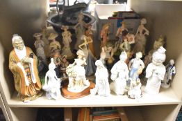 A selection of porcelain and resin figures and figurines to include Chinese mudmen examples etc.