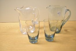 A mid 20th-century Whitefriars glass 'dimple' pitcher; sold with a light blue pitcher with two