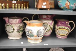 A quantity of Victorian Sunderland lustreware pottery jugs, to include pink and orange lustreware
