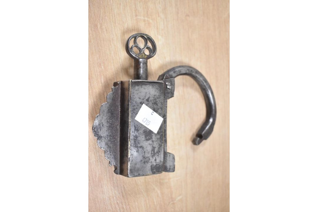 A late 19th to early 20th century Mughal iron and brass padlock, with a screw type key, of ornate - Image 2 of 2