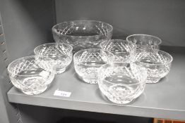 A quantity of 20th-century Stuart Crystal-style cut glass bowls, featuring a diamond-shaped cuts