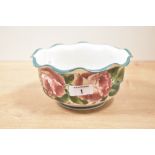 A 19th-century Scottish Wemyss Ware pottery bowl, having a scalloped edge with delicate cabbage rose