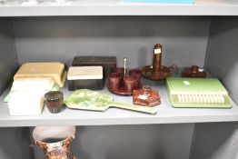 A quantity of 20th-century bakelite ware, to include an Art Deco Elo Ware box featuring a detailed