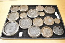 A large assortment of 20th-century iron nesting weights, to include examples from A.K and Sons, C.