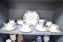 A 20th-century Bridgewood pottery china 'Hawthorn' part tea set, featuring floral motifs in a