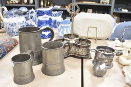 A quantity of 20th-century pewter and silver plate metalware, to include three graduating