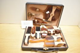 An early 20th-century American The Tuskeloid Company Gentleman's Celluloid travel vanity set, to