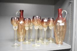 A Selection of 20th-Century Iranian Glassware, including two water jugs with slender, elongated