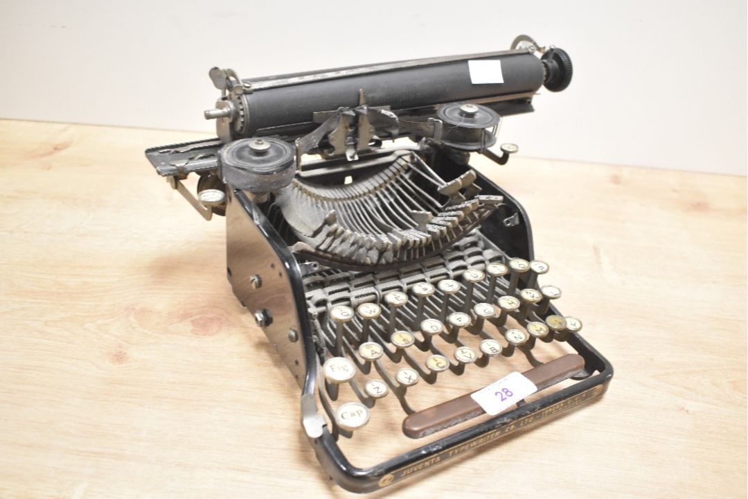 An early 20th-century Italian Juventa Standard portable typewriter, model number 5, featuring a - Image 1 of 3