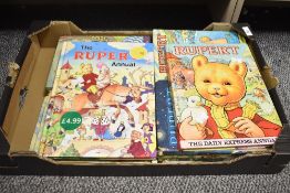 A large quantity of 20th-century Rupert Bear Annuals; sold with a selection of children stories,