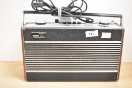 A 20th-century Roberts RP26-B portable radio, 30cm, condition consistent with age and use.