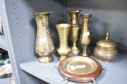 A quantity of 20th-century brassware, to include a selection of bud vases featuring etched floral