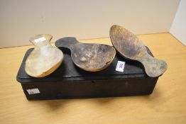 Three 20th-century African Art carved spoons; sold with an elongated wooden box, (4), condition is