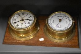 A 20th-century Greenoble of London brass-cased marine clock and barometer set, of roman numerals