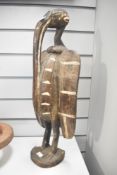 A small 20th-century West African carved Senufo Sejen Hornbill (Kalao bird), presumed to be from the