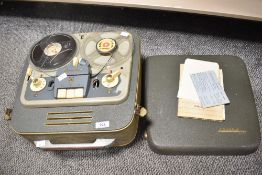 A mid 20th-century Grundig TK8 Tape Recorder, accompanied by original Guide Book and EMI tape,