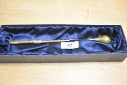 A 20th-century South American gilded metal bombilla, a filtered straw used for drinking Yerba Mate