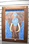 A large 20th-century African Art framed painting of an elephant, rendered in a fusion of a colourful
