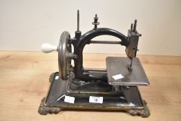 A 19th-century German Guhl and Harbeck 'Original Express' metal miniature table top hand-crank