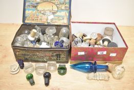 A quantity of 19th to 20th-century bottle stoppers, to include glass, wood, and ceramic examples, (2