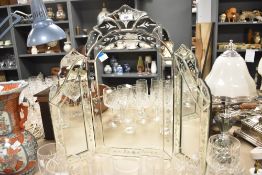A contemporary Venetian-style triptych vanity mirror with floral etched glass detailing, 52cm