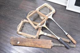 A quantity of 20th-century vintage wooden sports equipment, to include a wooden cricket bat, two