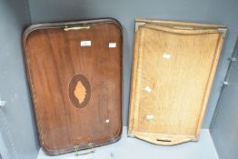 An Edwardian mahogany Georgian Revival serving platter, featuring inlaid conch shell detailing