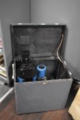 A 20th-century blue NHTEC.63.MK optical instrument, presumed telescope, accompanied by a storage box