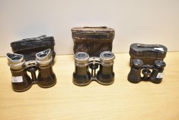 Three Victorian opera glasses, to include two French Le Jockey Club examples featuring a brown