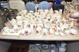 A large quantity of 20th-century miniature crested china ornaments, to include a selection of