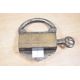 A late 19th to early 20th century Mughal iron and brass padlock, with a screw type key, of ornate - Image 1 of 2