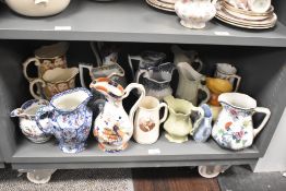 A selection of 19th to early 20th century ewers/jugs, to include a pair of Minton Porcelain ware ivy