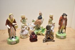 A quantity of 20th-century to modern figurines, to include a resin Buddha, a pottery Ruffed