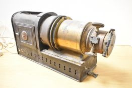 A Victorian brass and tin Magic Lantern, unmarked, 46cm, condition is consistent with age and use,