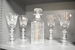 A group of four Cumbria Crystal Keswick cut air trap ball stem wine goblets, 22.5cm together with
