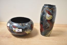 A 20th-century Art Deco-style Decoro pottery vase and bowl, featuring a stylised bird of paradise