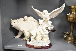 Three 20th-century The Natalia Collection figurines, to include a large polar bear mother with two