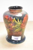 An early 20th-century Moorcroft Pottery 'Flambe Anemone' vase, featuring tube-lined floral