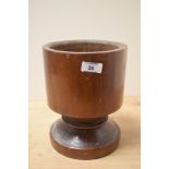 A large 20th-century 'treen' apothecary mortar, made from a single piece of wood, unmarked, 22cm,