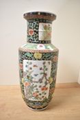 A large Chinese porcelain famille verte vase, of baluster form featuring colourful foliate and