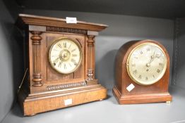 A 20th-century Thomas Fattorini's 'Burglar Alarm' style walnut mantel clock, featuring a dual