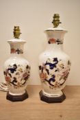 Two 20th-century Masons Ironstone Blue Mandalay patterned table lamps, featuring delicate floral