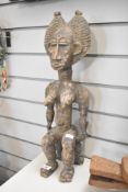 A 20th-century African Tribal Art carved wood 'Attie' Statue, presumed to be from the lagoon area of
