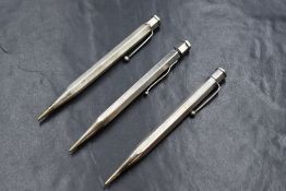 Three hexagonal Yard o Led mechanical pencils. One Sterling Silver two Hallmarked London 1938 & 1951