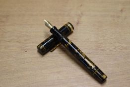A Conklin Endura lever fill fountain pen in Brown Marble a broad cap band having Conklin Endura nib.
