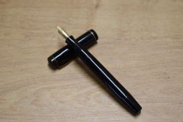 A Mentmore Diploma button fill fountain pen in Black with single narrow cap band having Mentmore